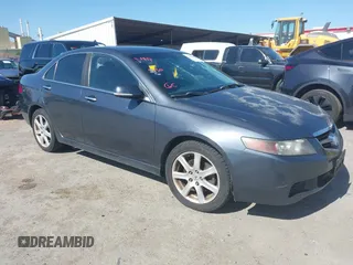 2004 Acura TSX with VIN JH4CL96864C046425, listed as a IAAI auction lot 42362895 with 188,338 mi miles and . Bid and sale history available at DreamBid. Image 1.