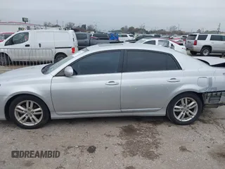 2012 Toyota Avalon z VIN 4T1BK3DB7CU453850, wystawiony jako IAAI lot #41425863 z przebiegiem 142 623 mil mil oraz . Historia ofert i sprzedaży dostępna na DreamBid. Obrazek 14.