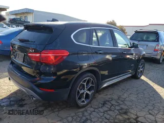 2018 BMW X1 xDrive28i with VIN WBXHT3C38J5K24660, listed as a Copart auction lot 44387043 with 59,786 mi miles. Bid and sale history available at carsss.com. Image 3.