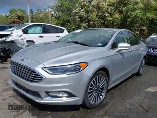 2017 Ford Fusion Titanium with VIN 3FA6P0K90HR266556, listed as a IAAI auction lot 41947924 with 135,628 mi miles. Bid and sale history available at carsss.com. Image 2.