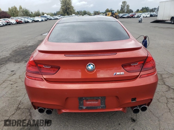 2014 BMW M6 z VIN WBSLX9C52ED160071, wystawiony jako Copart lot #77452554 z przebiegiem 64 814 mil mil oraz Szkoda całkowita • Salvage title. Historia ofert i sprzedaży dostępna na DreamBid. Obrazek 6.