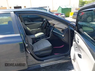 2015 Toyota Camry XLE with VIN 4T1BF1FK1FU072635, listed as a IAAI auction lot 42145826 with 101,633 mi miles. Bid and sale history available at carsss.com. Image 5.