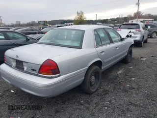 2003 Ford Crown Victoria LX z VIN 2FAFP74W53X151974, wystawiony jako IAAI lot #40887020 z przebiegiem 186 149 mil mil oraz . Historia ofert i sprzedaży dostępna na DreamBid. Obrazek 4.