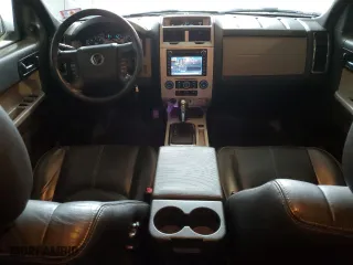 2011 Mercury Mariner Premier with VIN 4M2CN8HG0BKJ05427, listed as a Copart auction lot 73023044 with 132,452 mi miles and Salvage Title. Bid and sale history available at carsss.com. Image 8.