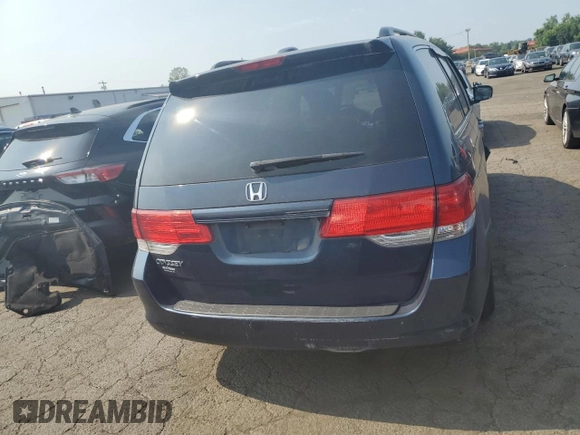 2010 Honda Odyssey EX-L z VIN 5FNRL3H73AB089714, wystawiony jako Copart lot #60276305 z przebiegiem 125 025 mil mil oraz Szkoda całkowita • Salvage title. Historia ofert i sprzedaży dostępna na DreamBid. Obrazek 6.