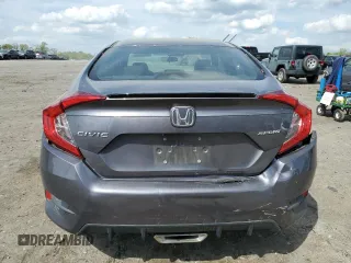 2019 Honda Civic Sport with VIN 2HGFC2F81KH513171, listed as a Copart auction lot 54030235 with 57,516 mi miles and Salvage Title. Bid and sale history available at DreamBid. Image 6.