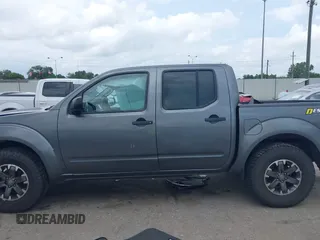 2016 Nissan Frontier SV z VIN 1N6AD0ER0GN763193, wystawiony jako IAAI lot #42137941 z przebiegiem 118 660 mil mil oraz . Historia ofert i sprzedaży dostępna na DreamBid. Obrazek 14.