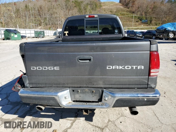 2004 Dodge Dakota Sport z VIN 1D7HG38K94S556894, wystawiony jako Copart lot #79743994 z przebiegiem 174 933 mil mil oraz Szkoda całkowita • Salvage title. Historia ofert i sprzedaży dostępna na DreamBid. Obrazek 6.
