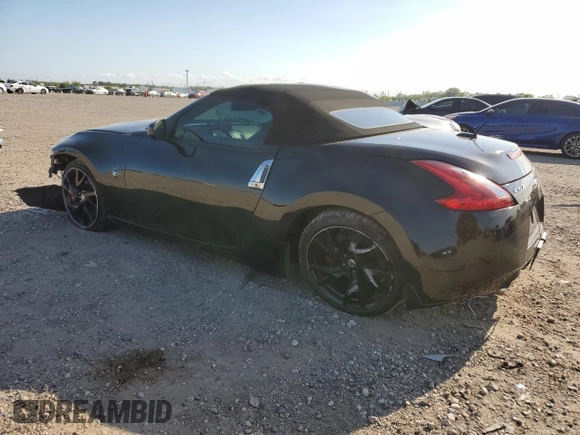 2014 Nissan 370Z Touring with VIN JN1AZ4FH3EM621279, listed as a Copart auction lot 52284814 with 60,479 mi miles and Salvage Title. Bid and sale history available at DreamBid. Image 2.