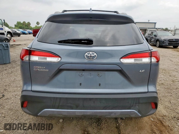 2023 Toyota Corolla Cross LE z VIN 7MUCAAAG4PV038470, wystawiony jako Copart lot #55999615 z przebiegiem 41 269 mil mil oraz Szkoda całkowita • Salvage title. Historia ofert i sprzedaży dostępna na DreamBid. Obrazek 6.