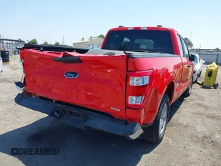 2021 Ford F-150 XL with VIN 1FTEX1C82MKE57427, listed as a IAAI auction lot 42149679 with 52,014 mi miles and . Bid and sale history available at DreamBid. Image 4.