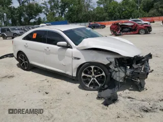 2016 Ford Taurus SEL z VIN 1FAHP2E86GG138691, wystawiony jako Copart lot #57495575 z przebiegiem Nie podano mil oraz Szkoda całkowita • Salvage title. Historia ofert i sprzedaży dostępna na DreamBid. Obrazek 4.