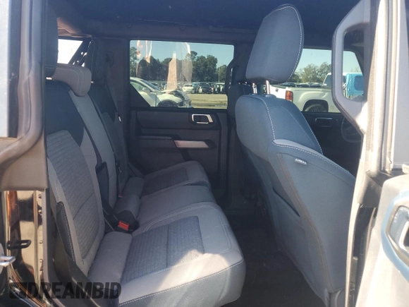 2023 Ford Bronco with VIN 1FMDE5BHXPLA82939, listed as a Copart auction lot 81402454 with 23,392 mi miles and Salvage Title. Bid and sale history available at DreamBid. Image 10.