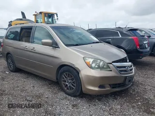 2007 Honda Odyssey EX-L z VIN 5FNRL38717B102646, wystawiony jako IAAI lot #42380196 z przebiegiem 234 088 mil mil oraz . Historia ofert i sprzedaży dostępna na DreamBid. Obrazek 1.