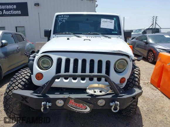 2013 Jeep Wrangler Unlimited Sport with VIN 1C4BJWDGXDL694054, listed as a IAAI auction lot 42097708 with 130,360 mi miles and . Bid and sale history available at DreamBid. Image 13.
