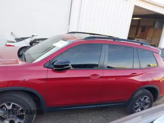 2022 Honda Passport TrailSport with VIN 5FNYF8H61NB015883, listed as a IAAI auction lot 40662061 with 19,212 mi miles and . Bid and sale history available at carsss.com. Image 13.