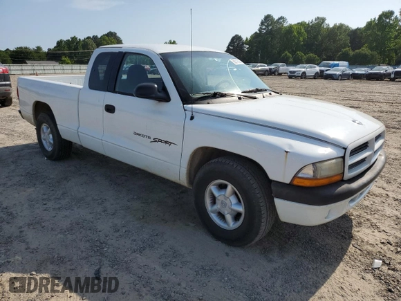 2001 Dodge Dakota z VIN 1B7GL22X21S128774, wystawiony jako Copart lot #58313685 z przebiegiem 167 355 mil mil oraz Czysty tytuł • Clean title. Historia ofert i sprzedaży dostępna na DreamBid. Obrazek 4.
