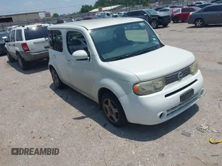 2010 Nissan Cube S z VIN JN8AZ2KR8AT166837, wystawiony jako IAAI lot #42286058 z przebiegiem 252 834 mil mil oraz . Historia ofert i sprzedaży dostępna na DreamBid. Obrazek 1.