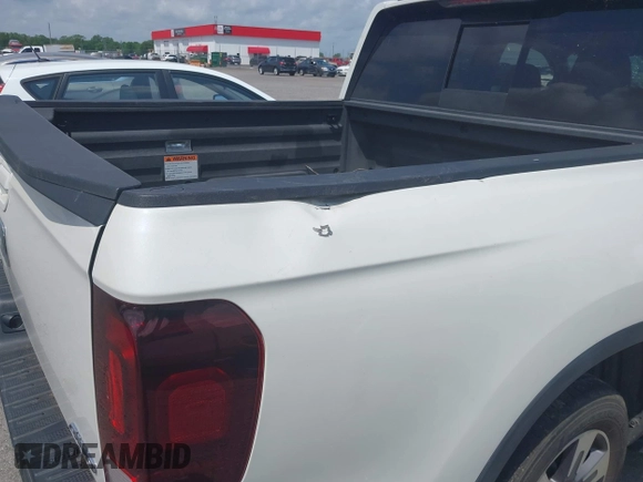 2019 Honda Ridgeline RTL-E with VIN 5FPYK3F77KB021667, listed as a IAAI auction lot 42115019 with 87,221 mi miles and . Bid and sale history available at DreamBid. Image 20.