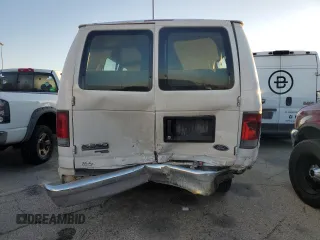 2006 Ford Econoline Passenger XL with VIN 1FBSS31L66DA77295, listed as a Copart auction lot 77022084 with 279,140 mi miles and Salvage Title. Bid and sale history available at carsss.com. Image 6.