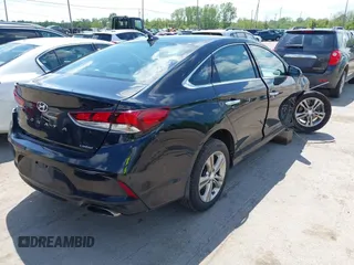 2019 Hyundai Sonata Sport z VIN 5NPE34AF1KH797081, wystawiony jako IAAI lot #42260397 z przebiegiem 72 348 mil mil oraz . Historia ofert i sprzedaży dostępna na DreamBid. Obrazek 4.