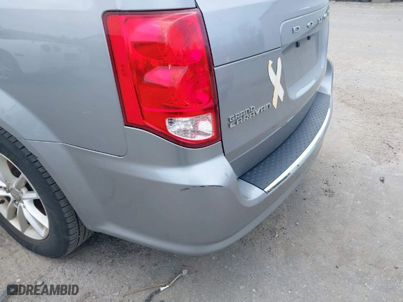 2015 Dodge Grand Caravan SXT with VIN 2C4RDGCG9FR733269, listed as a IAAI auction lot 41901569 with NaN miles. Bid and sale history available at carsss.com. Image 14.