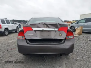 2009 Honda Civic LX z VIN 1HGFA16539L005299, wystawiony jako IAAI lot #41848263 z przebiegiem 169 019 mil mil oraz . Historia ofert i sprzedaży dostępna na DreamBid. Obrazek 16.
