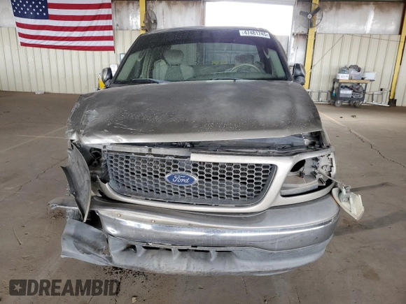 2003 Ford F-150 XL z VIN 1FTRX17233NB60705, wystawiony jako Copart lot #47481745 z przebiegiem 306 645 mil mil oraz Szkoda całkowita • Salvage title. Historia ofert i sprzedaży dostępna na DreamBid. Obrazek 5.