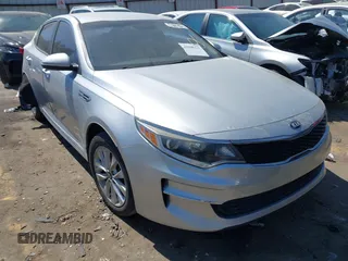 2018 Kia Optima LX z VIN 5XXGT4L3XJG271957, wystawiony jako IAAI lot #41898321 z przebiegiem 100 273 mil mil oraz . Historia ofert i sprzedaży dostępna na DreamBid. Obrazek 1.