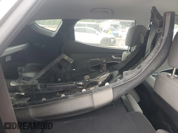2017 Hyundai Santa Fe 2.4L z VIN 5NMZT3LBXHH038022, wystawiony jako Copart lot #51060545 z przebiegiem 63 790 mil mil oraz Szkoda całkowita • Salvage title. Historia ofert i sprzedaży dostępna na DreamBid. Obrazek 12.