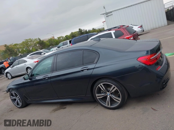 2019 BMW 7 Series 750i with VIN WBA7F0C50KGM26010, listed as a IAAI auction lot 42188421 with 71,576 mi miles and . Bid and sale history available at DreamBid. Image 15.