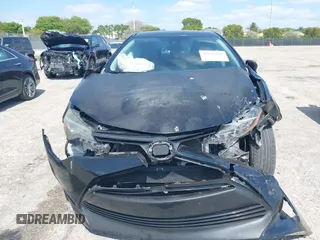2019 Toyota Corolla L z VIN 5YFBURHE1KP865263, wystawiony jako IAAI lot #42153766 z przebiegiem 62 827 mil mil oraz . Historia ofert i sprzedaży dostępna na DreamBid. Obrazek 6.