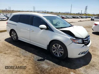 2015 Honda Odyssey Touring Elite z VIN 5FNRL5H91FB053430, wystawiony jako Copart lot #55276315 z przebiegiem 96 667 mil mil oraz Szkoda całkowita • Salvage title. Historia ofert i sprzedaży dostępna na DreamBid. Obrazek 4.