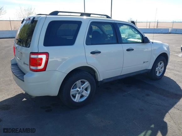 2009 Ford Escape Hybrid with VIN 1FMCU49349KA19086, listed as a IAAI auction lot 41704934 with 91,047 mi miles. Bid and sale history available at carsss.com. Image 4.
