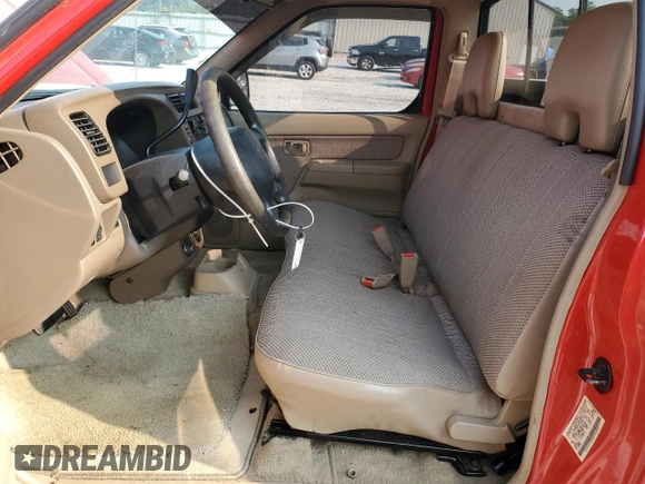1998 Nissan Frontier XE with VIN 1N6DD21S4WC343917, listed as a Copart auction lot 59346585 with 127,324 mi miles and Salvage title. Bid and sale history available at DreamBid. Image 7.