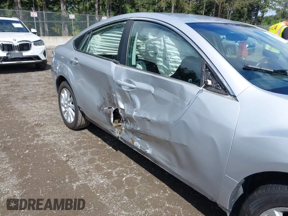 2012 Mazda 6 i Touring with VIN 1YVHZ8DH9C5M34135, listed as a IAAI auction lot 42306240 with 122,709 mi miles and . Bid and sale history available at DreamBid. Image 6.