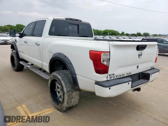 2016 Nissan Titan Platinum Reserve с VIN 1N6BA1F21GN513109, выставлен на аукционе Copart как лот 56116825 с пробегом 94 263 миль миль и Чистый • Clean title. История ставок и продаж доступна на DreamBid. Изображение 2.
