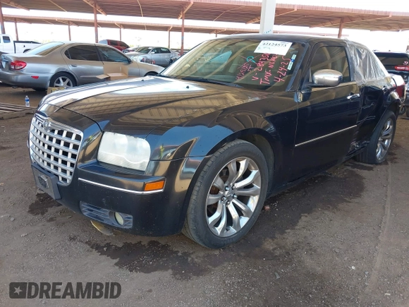 2010 Chrysler 300 Touring with VIN 2C3CA5CV9AH284356, listed as a IAAI auction lot 42124573 with 208,519 mi miles and . Bid and sale history available at DreamBid. Image 2.