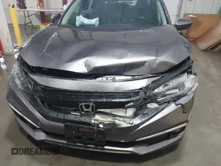 2020 Honda Civic EX-L with VIN 19XFC1F70LE010163, listed as a IAAI auction lot 41306532 with 88,767 mi miles and . Bid and sale history available at DreamBid. Image 6.