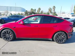 2021 Tesla Model Y Performance with VIN 5YJYGDEF5MF211592, listed as a IAAI auction lot 41766033 with 59,694 mi miles. Bid and sale history available at carsss.com. Image 15.