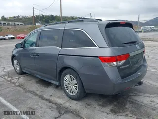 2014 Honda Odyssey LX with VIN 5FNRL5H28EB101376, listed as a IAAI auction lot 41772529 with 122,504 mi miles. Bid and sale history available at carsss.com. Image 3.