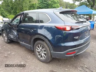 2019 Mazda CX-9 Touring with VIN JM3TCBCY6K0334898, listed as a IAAI auction lot 42467677 with 69,454 mi miles and . Bid and sale history available at DreamBid. Image 3.