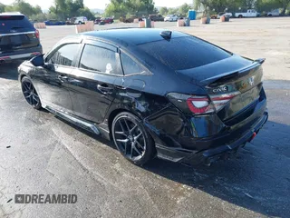 2024 Honda Civic Si z VIN 2HGFE1E57RH471112, wystawiony jako IAAI lot #41981451 z przebiegiem 18 393 mil mil oraz . Historia ofert i sprzedaży dostępna na DreamBid. Obrazek 3.