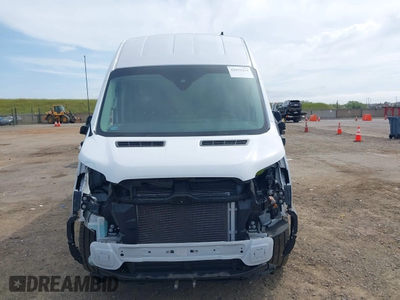 2022 Ford Transit Cargo with VIN 1FTBW3XG9NKA84214, listed as a IAAI auction lot 42033413 with 6,746 mi miles and . Bid and sale history available at DreamBid. Image 6.