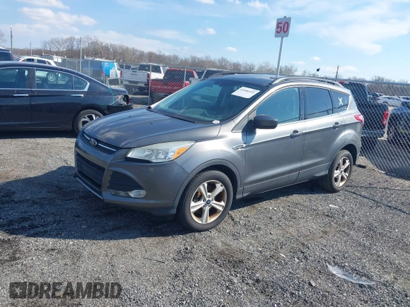 2014 Ford Escape SE with VIN 1FMCU9G98EUD26411, listed as a IAAI auction lot 41686493 with 132,644 mi miles. Bid and sale history available at carsss.com. Image 2.