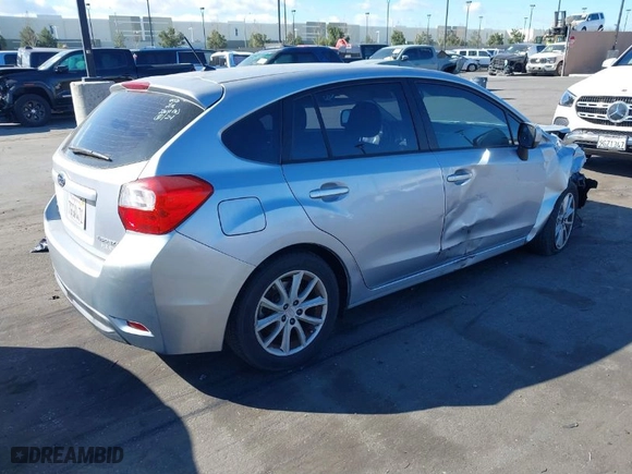 2014 Subaru Impreza Wagon 2.0i Premium with VIN JF1GPAC64E8257757, listed as a IAAI auction lot 41698899 with 173,373 mi miles. Bid and sale history available at carsss.com. Image 4.