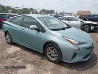 2016 Toyota Prius Two z VIN JTDKBRFU6G3007769, wystawiony jako IAAI lot #42465634 z przebiegiem 117 779 mil mil oraz . Historia ofert i sprzedaży dostępna na DreamBid. Obrazek 1.