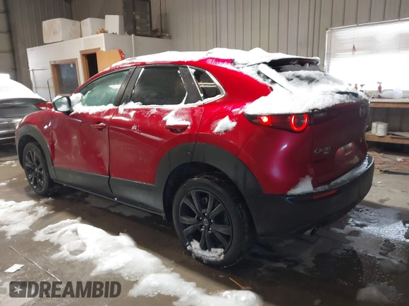 2022 Mazda CX-30 2.5 Turbo with VIN 3MVDMBAY5NM427943, listed as a IAAI auction lot 41585519 with 32,807 mi miles and . Bid and sale history available at DreamBid. Image 3.
