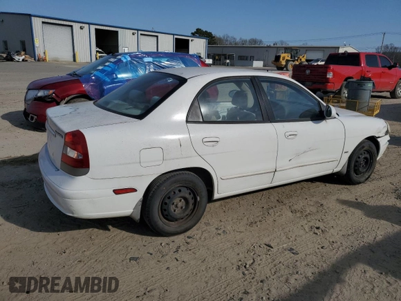 2001 Daewoo Nubira z VIN KLAJC52Z01K711120, wystawiony jako Copart lot #48926575 z przebiegiem 103 375 mil mil oraz Tytuł czysty. Historia ofert i sprzedaży dostępna na DreamBid. Obrazek 3.