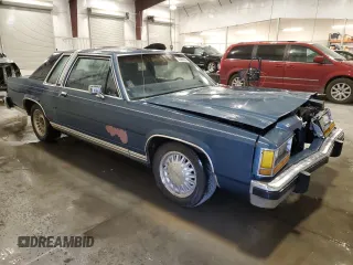 1987 Ford Crown Victoria z VIN 2FABP71F2HX156902, wystawiony jako Copart lot #74368944 z przebiegiem 77 708 mil mil oraz Szkoda całkowita • Salvage title. Historia ofert i sprzedaży dostępna na DreamBid. Obrazek 4.